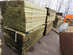 STACK OF 2 X LARGE PACKS OF TREATED FEATHER EDGE CLADDING TIMBER BOARDS: 1.5M LENGTH X 100MM WIDTH A