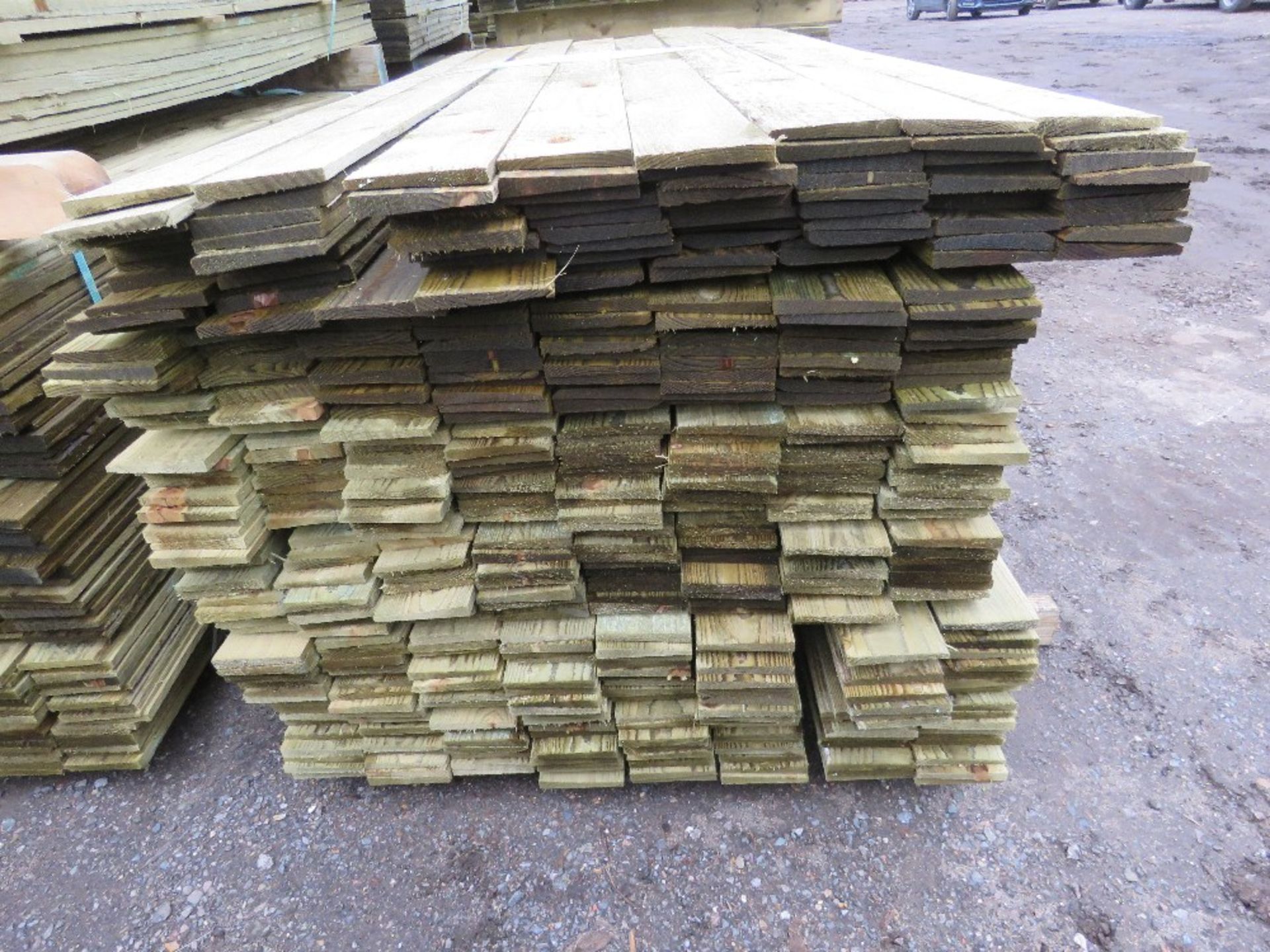 LARGE PACK OF TREATED FEATHER EDGE CLADDING TIMBER BOARDS: 1.8M LENGTH X 100MM WIDTH APPROX. - Image 2 of 3