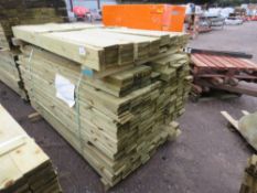 STACK OF 2 X PACKS OF TREATED FEATHER EDGE CLADDING TIMBER BOARDS: MIXED 1.2-1.8M LENGTH X 100MM W