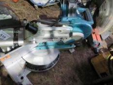 MAKITA 110VOLT MITRE SAW WITH SLIDING HEAD.