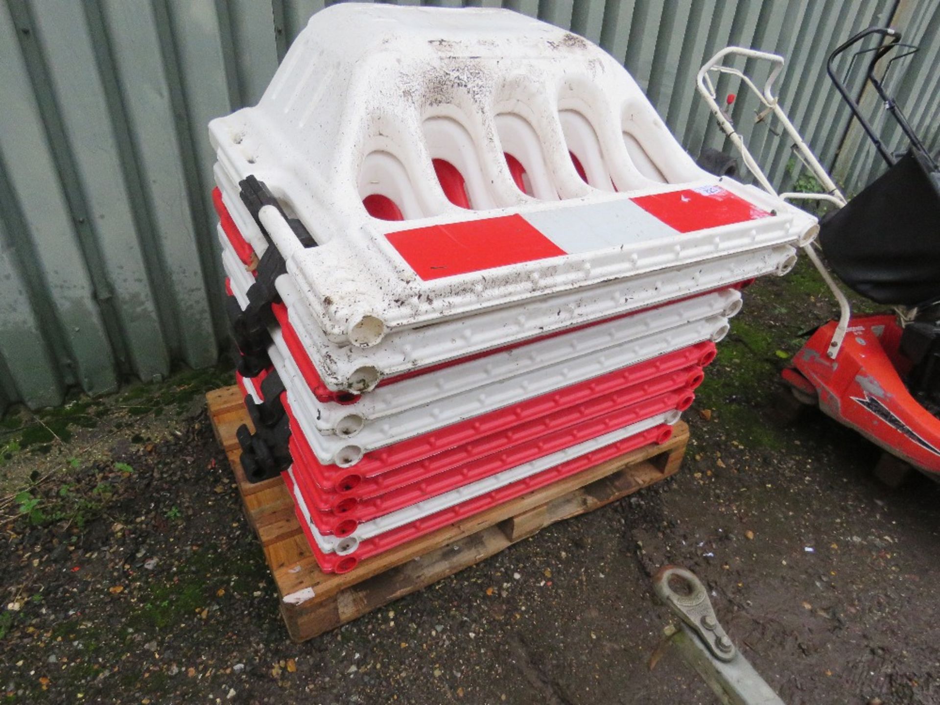 10NO RED AND WHITE PLASTIC BARRIERS. THIS LOT IS SOLD UNDER THE AUCTIONEERS MARGIN SCHEME, THEREF