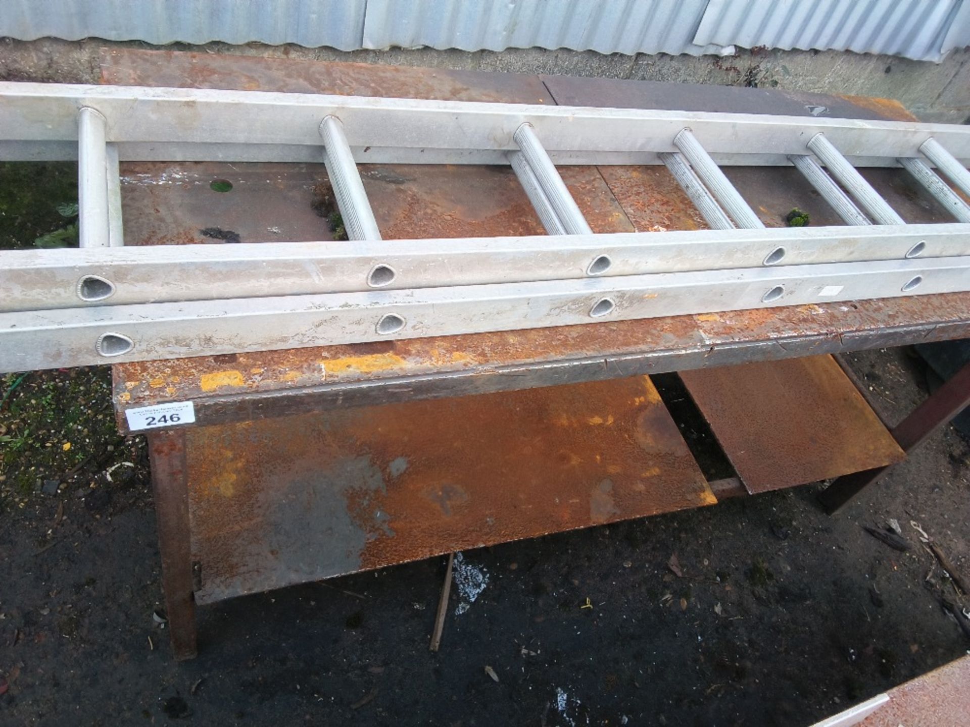 HEAVY DUTY WORKSHOP STEEL BENCH 1.7M LENGTH PLUS A LADDER. THIS LOT IS SOLD UNDER THE AUCTIONEERS