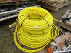 PALLET OF YELLOW PIPING.