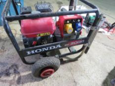 HONDA EC2000 WHEELED GENERATOR. THIS LOT IS SOLD UNDER THE AUCTIONEERS MARGIN SCHEME, THEREFORE N