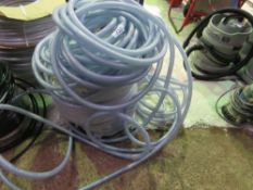 STACK OF ASSORTED PLASTIC HOSES. SOURCED FROM COMPANY LIQUIDATION. THIS LOT IS SOLD UNDER THE AU