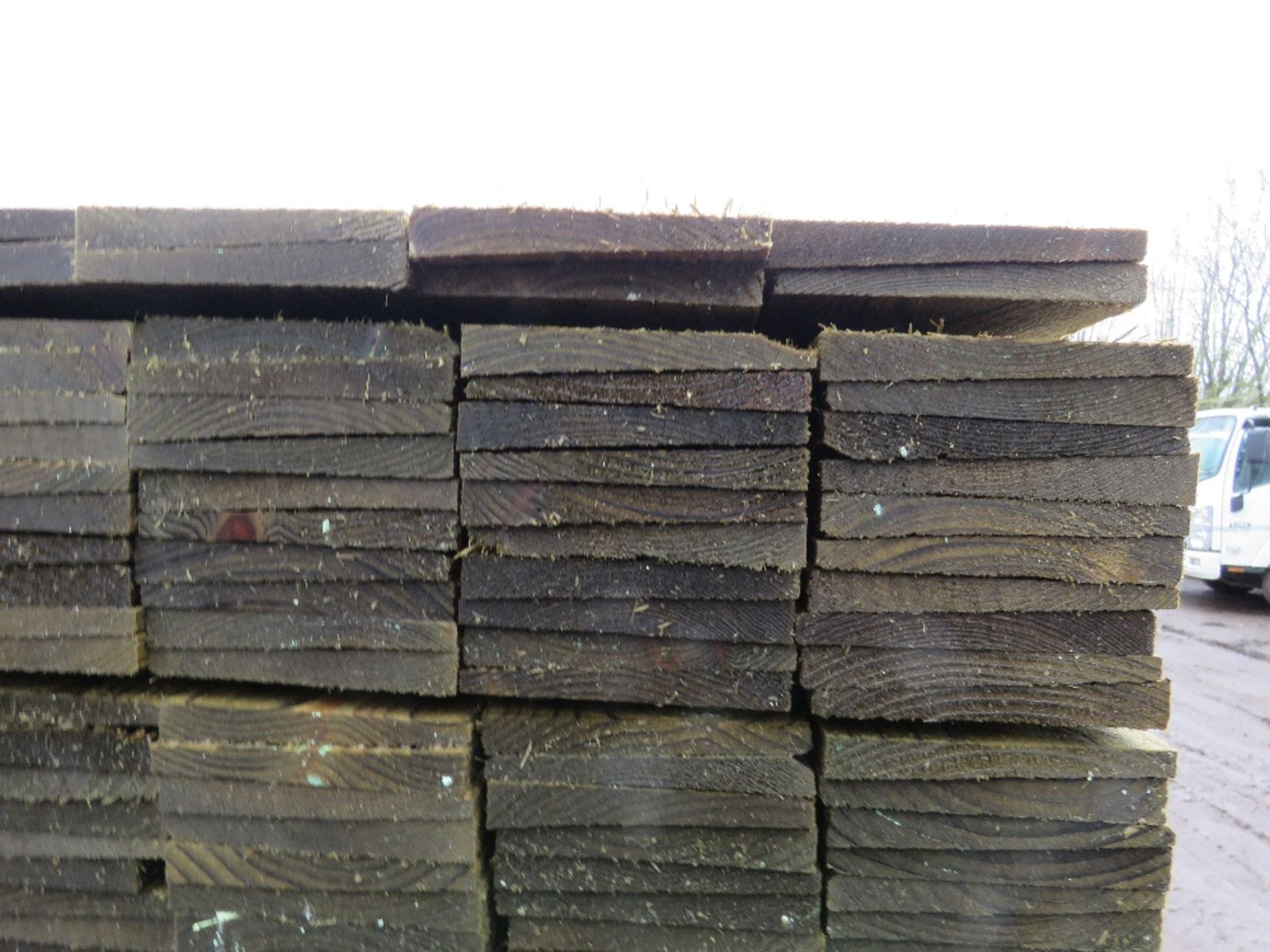 LARGE PACK OF TREATED FEATHER EDGE TIMBER CLADDING BOARDS 0.9M LENGTH X 100MM WIDTH APPROX. - Image 3 of 3