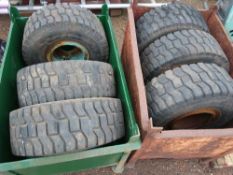 6 X HEAVY DUTY TRAILER WHEELS AND TYRES IN 2 X METAL STILLAGES.