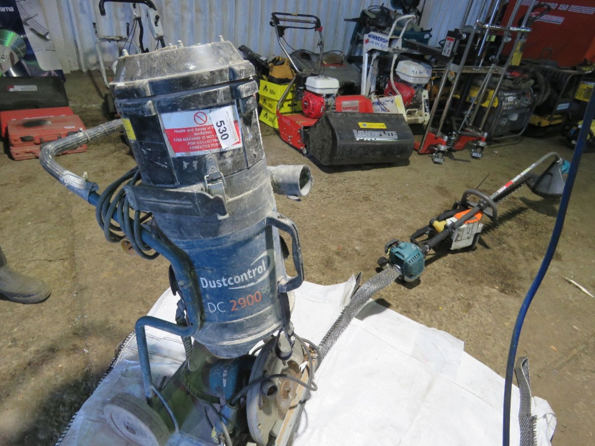 DUST CONTROL DC2900 110VOLT DUST EXTRACTION UNIT PLUS A MAKITA CIRCULAR SAW.