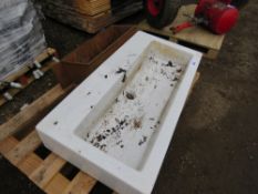 LARGE STONE SINK PLUS A CAST IRON TROUGH PLANTER.