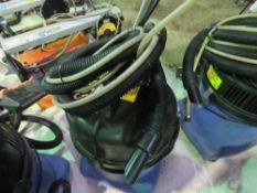 LARGE NUMATIC VACUUM CLEANER WITH HOSE AND HANDLE ATTACHMENT AS SHOWN.