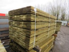 LARGE PACK OF TREATED FEATHER EDGE TIMBER CLADDING BOARDS 1.80M LENGTH X 100MM WIDTH APPROX.