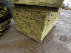 LARGE PACK OF TREATED HIT AND MISS CLADDING BOARDS 1.75M LENGTH X 100MM WIDTH APPROX.