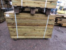LARGE PACK OF TREATED FEATHER EDGE TIMBER CLADDING BOARDS 1.2M LENGTH X 100MM WIDTH APPROX.
