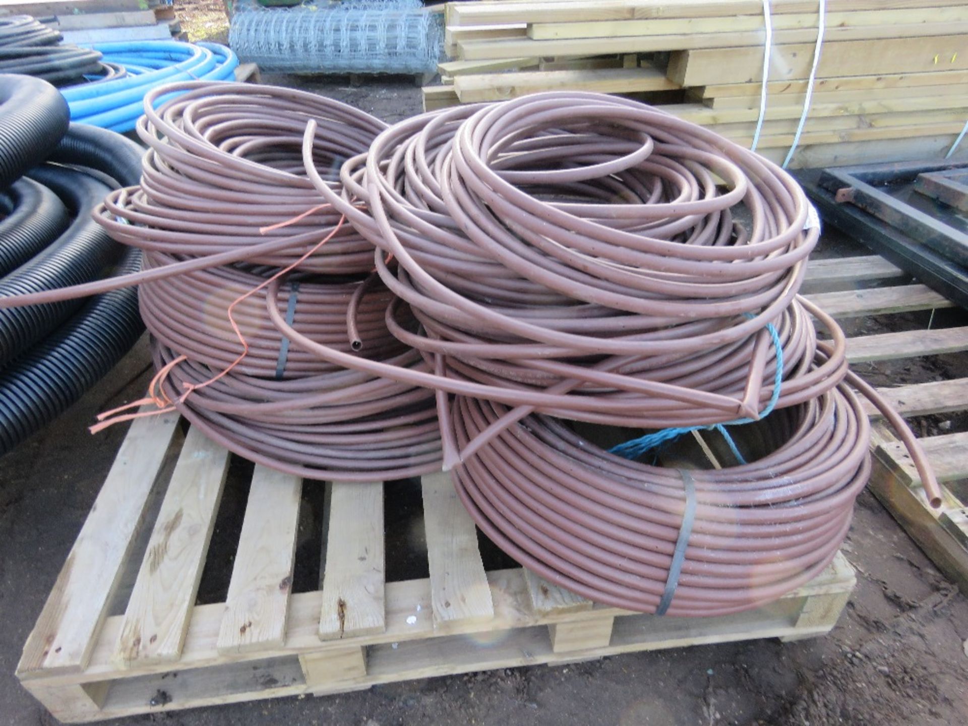 PALLET OF BROWN WEEPING IRRIGATION PIPING. THIS LOT IS SOLD UNDER THE AUCTIONEERS MARGIN SCHEME,