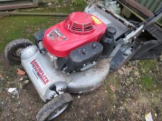 HONDA ROLLER MOWER WITH A COLLECTOR. SOURCED FROM LOCAL DEPOT CLOSURE.