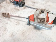 STIHL PETROL ENGINED POST HOLE BORER.