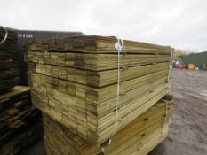 LARGE PACK OF TREATED HIT AND MISS CLADDING BOARDS 1.75M LENGTH X 100MM WIDTH APPROX.