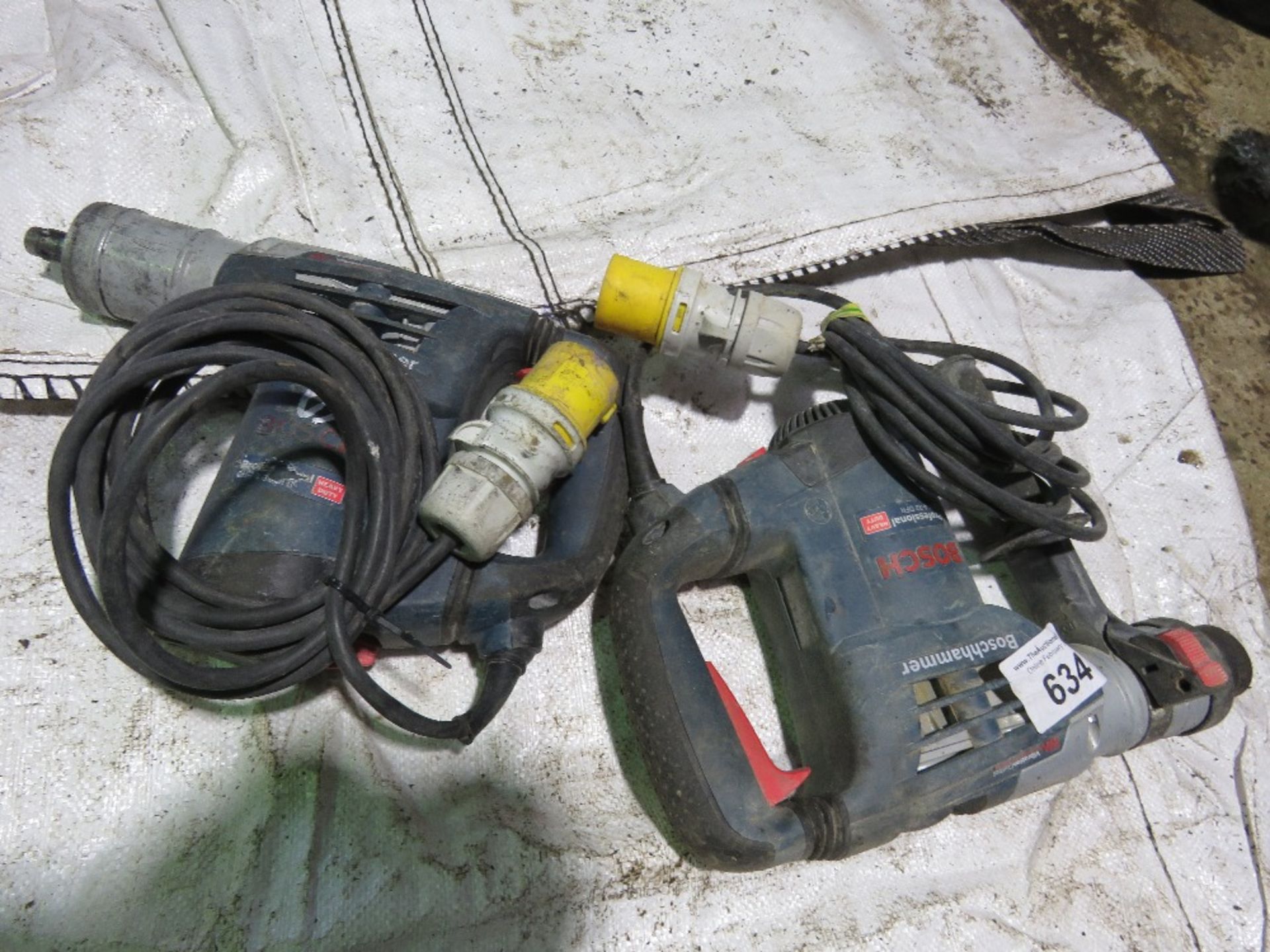 2 X BOSCH 110VOLT BREAKER DRILLS. THIS LOT IS SOLD UNDER THE AUCTIONEERS MARGIN SCHEME, THEREFORE