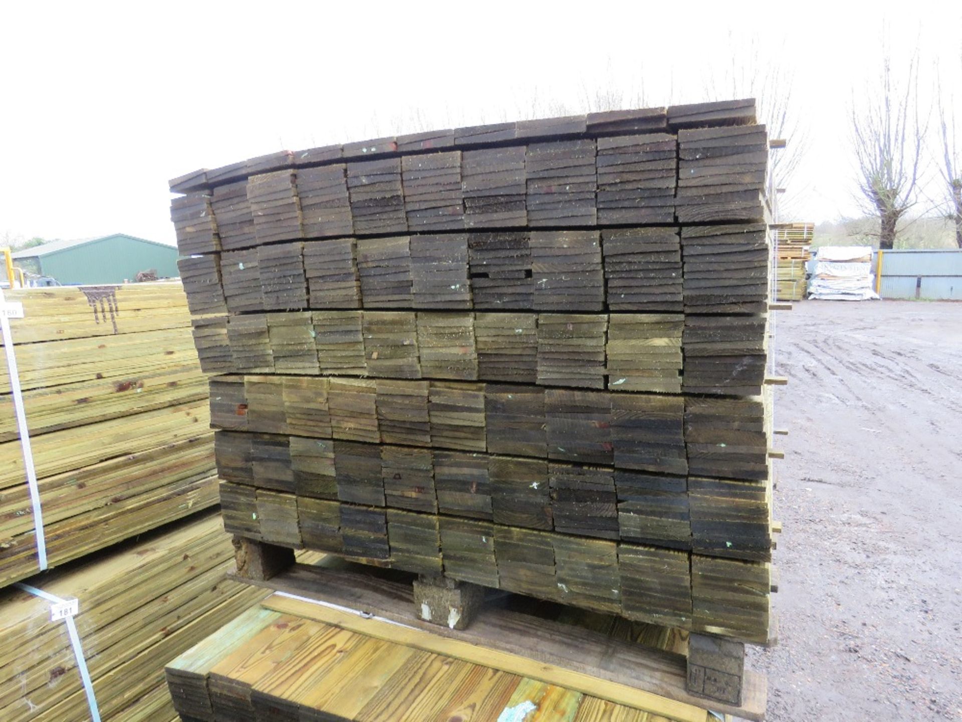 LARGE PACK OF TREATED FEATHER EDGE TIMBER CLADDING BOARDS 0.9M LENGTH X 100MM WIDTH APPROX. - Image 2 of 3