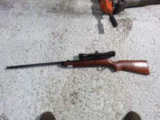 AIR RIFLE WITH SCOPE SIGHT. THIS LOT IS SOLD UNDER THE AUCTIONEERS MARGIN SCHEME, THEREFORE NO VA