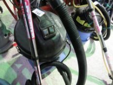 LARGE NUMATIC VACUUM CLEANER WITH HOSE AND HANDLE ATTACHMENT AS SHOWN.