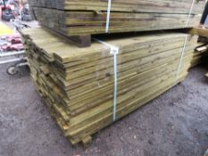 LARGE PACK OF TREATED FEATHER EDGE TIMBER CLADDING BOARDS 1.65M LENGTH X 100MM WIDTH APPROX.