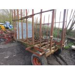 FLAT 8 BALE TRANSPORT TRAILER WITH MIDDLE SPIKE.