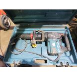 MAKITA MEDIUM SIZED BREAKER DRILL IN A CASE.