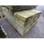 LARGE PACK OF TREATED FEATHER EDGE FENCE CLADDING TIMBER BOARDS. 1.80M LENGTH X 100MM WIDTH APPROX.