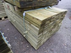 LARGE PACK OF TREATED FEATHER EDGE FENCE CLADDING TIMBER BOARDS. 1.80M LENGTH X 100MM WIDTH APPROX.