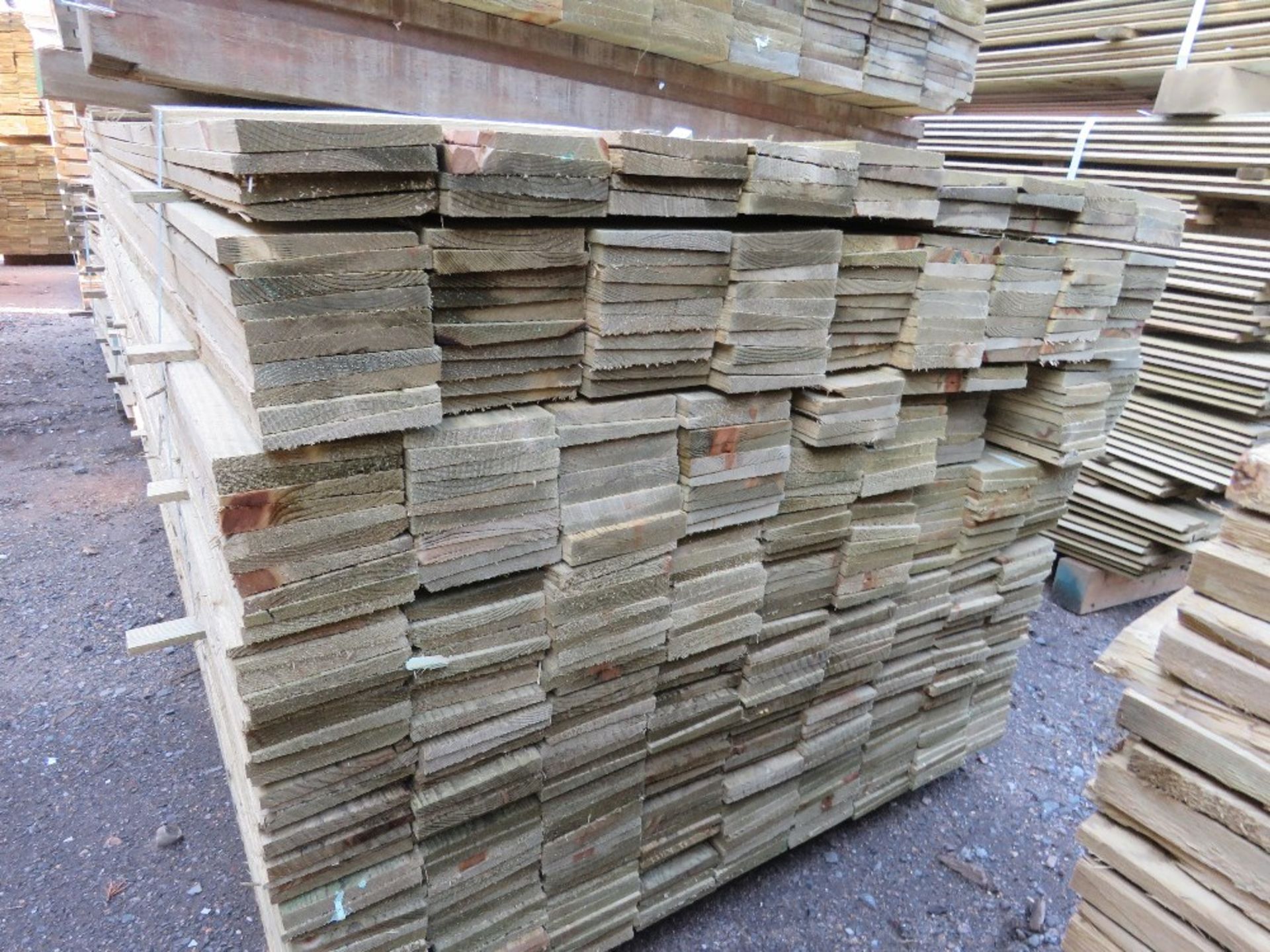 LARGE PACK OF TREATED FEATHER EDGE TIMBER CLADDING BOARDS 1.8M LENGTH X 100MM WIDTH APPROX. - Image 3 of 4