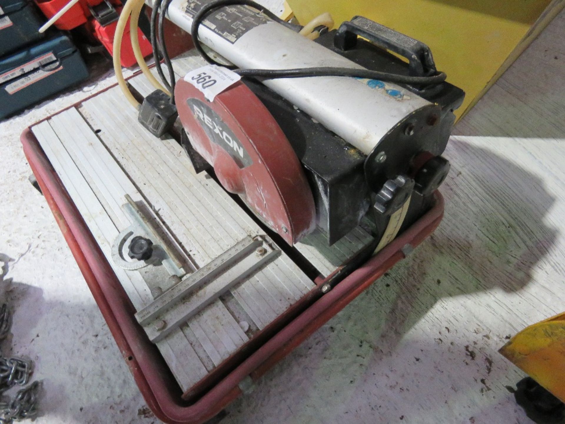 REXON SLIDING HEAD TILE SAW ON LEGS. DIRECT FROM LOCAL RETIRING BUILDER. THIS LOT IS SOLD UNDER - Image 5 of 5