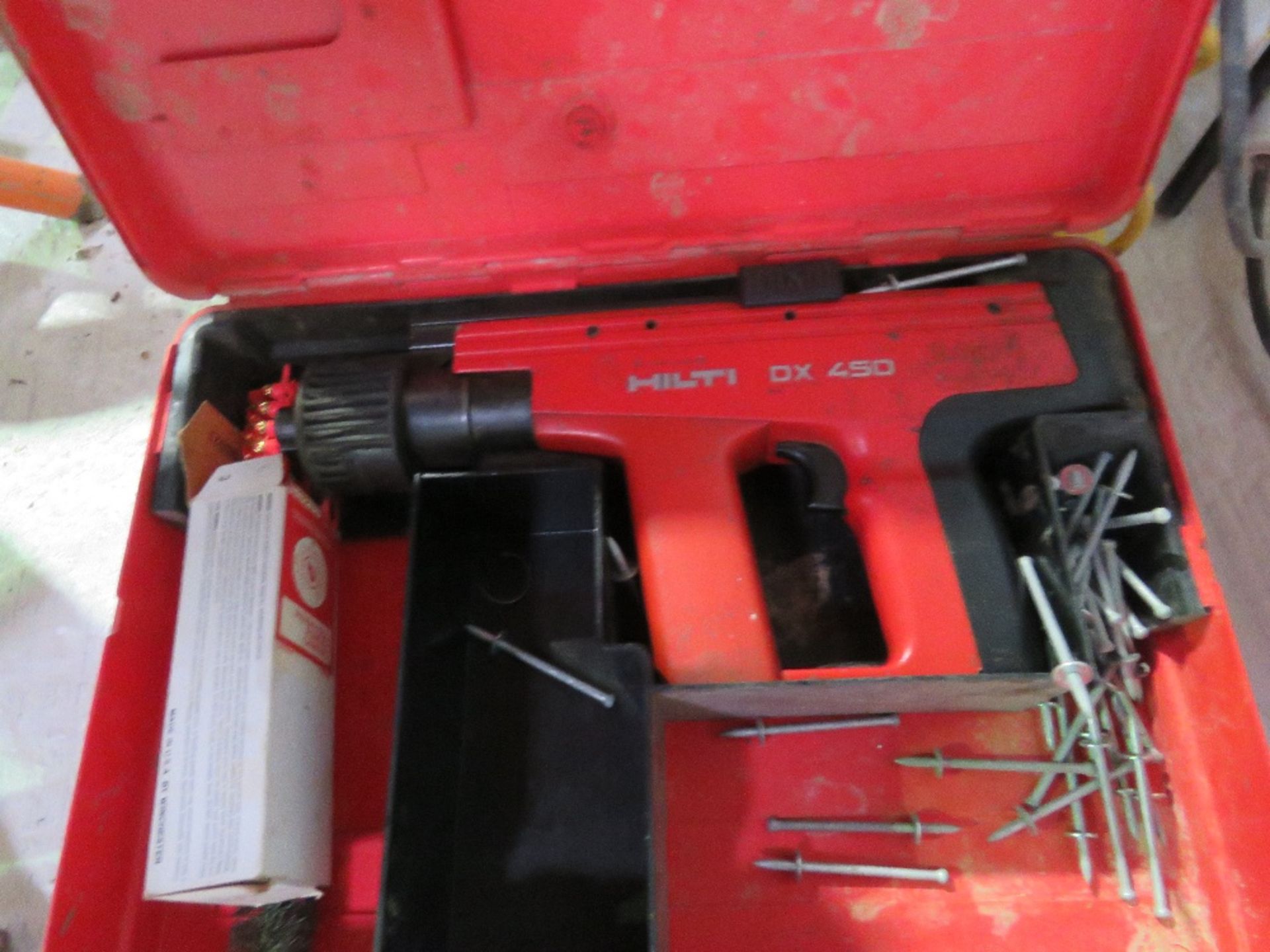 2 X HILTI DX450 NAIL GUNS. DIRECT FROM LOCAL RETIRING BUILDER. THIS LOT IS SOLD UNDER THE AUCTI