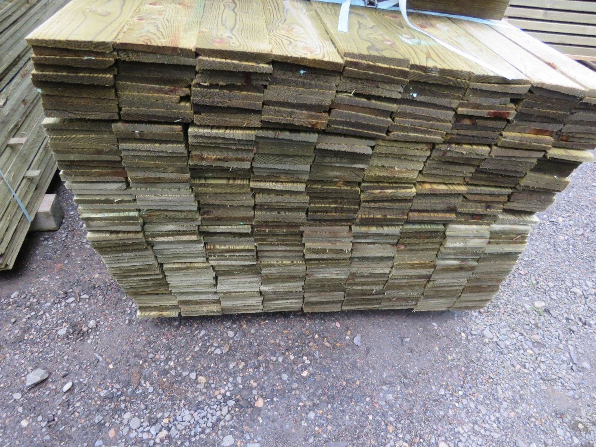LARGE PACK OF TREATED FEATHER EDGE FENCE CLADDING TIMBER BOARDS. 1.80M LENGTH X 100MM WIDTH APPROX. - Image 2 of 4