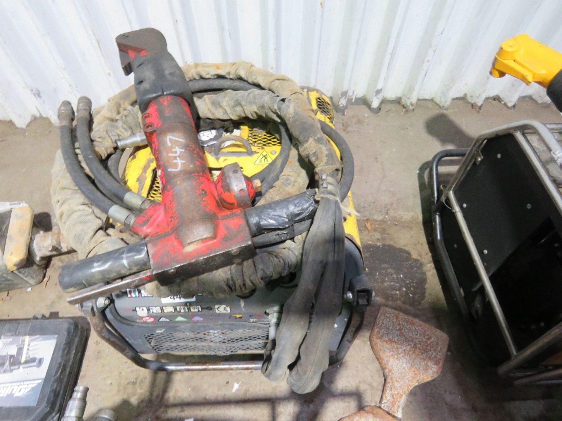 ATLAS COPCO HYDRAULIC BREAKER PACK WITH HOSE AND GUN.