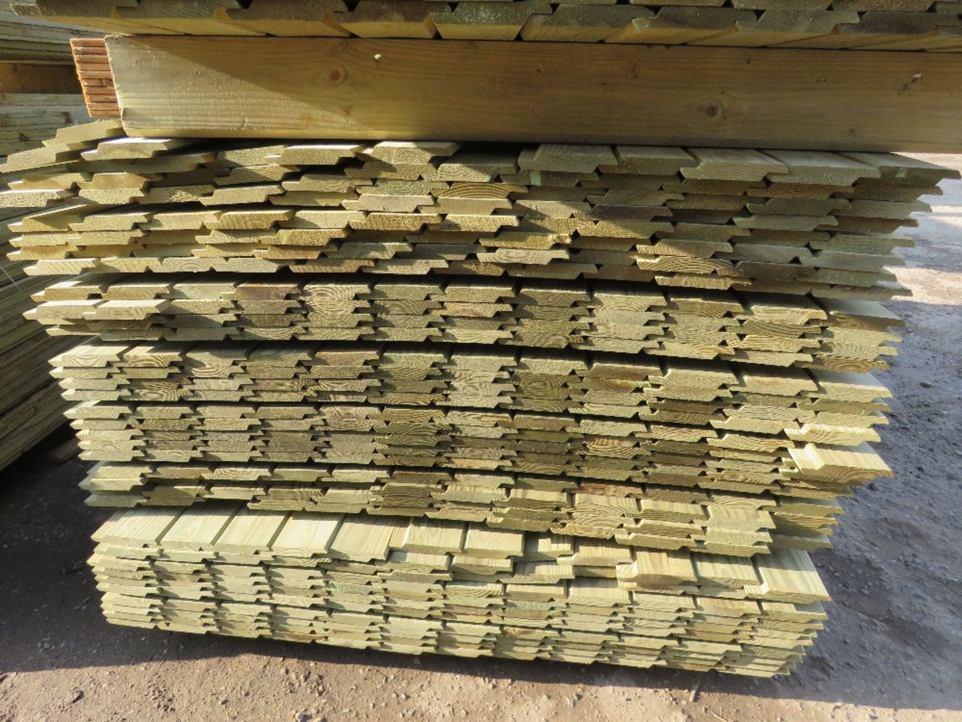 LARGE PACK OF TREATED SHIPLAP TIMBER CLADDING BOARDS MAINLY 1.73M LENGTH X 100MM WIDTH APPROX. - Image 2 of 3