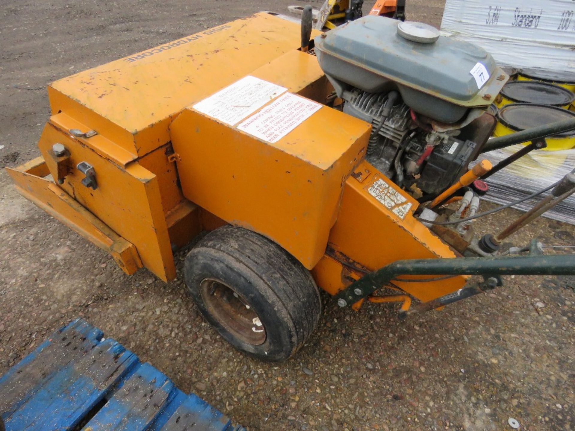 SISI HYDROCORE AERATOR UNIT WITH PETROL ENGINE. WHEN TESTED WAS SEEN TO DRIVE AND SPIKES MOVED..SEE