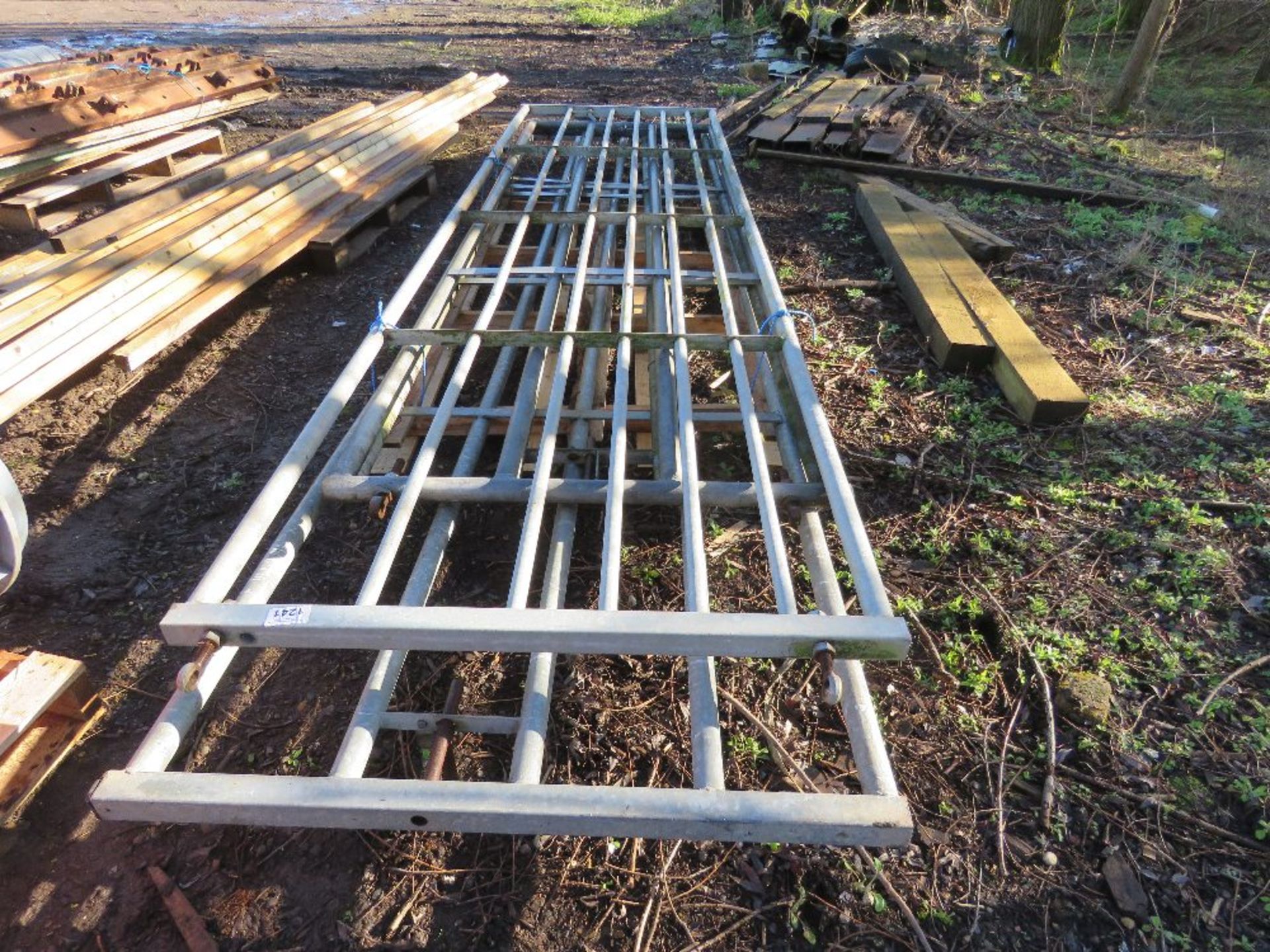 4NO GALVANISED FIELD GATES 12-16FT WIDTH APPROX. THIS LOT IS SOLD UNDER THE AUCTIONEERS MARGIN SC