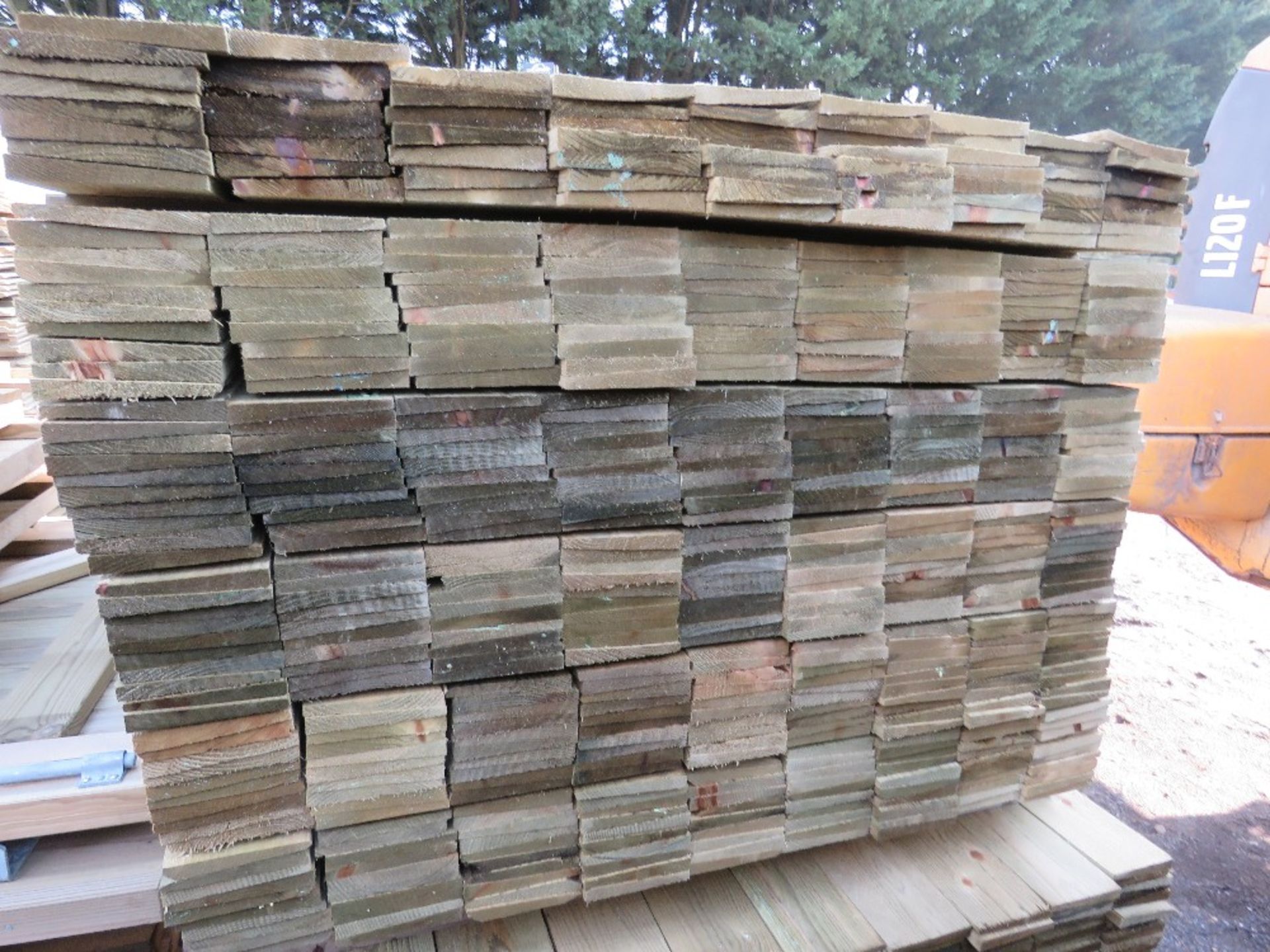 LARGE PACK OF TREATED FEATHER EDGE TIMBER CLADDING BOARDS 1.35M LENGTH X 100MM WIDTH APPROX. - Image 2 of 3