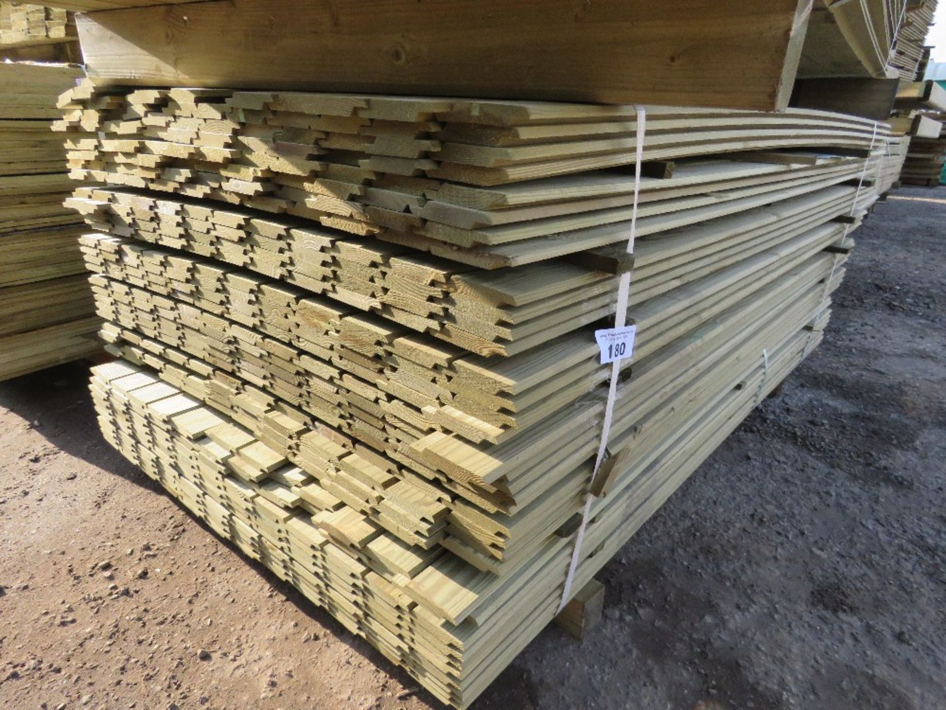 LARGE PACK OF TREATED SHIPLAP TIMBER CLADDING BOARDS MAINLY 1.73M LENGTH X 100MM WIDTH APPROX.