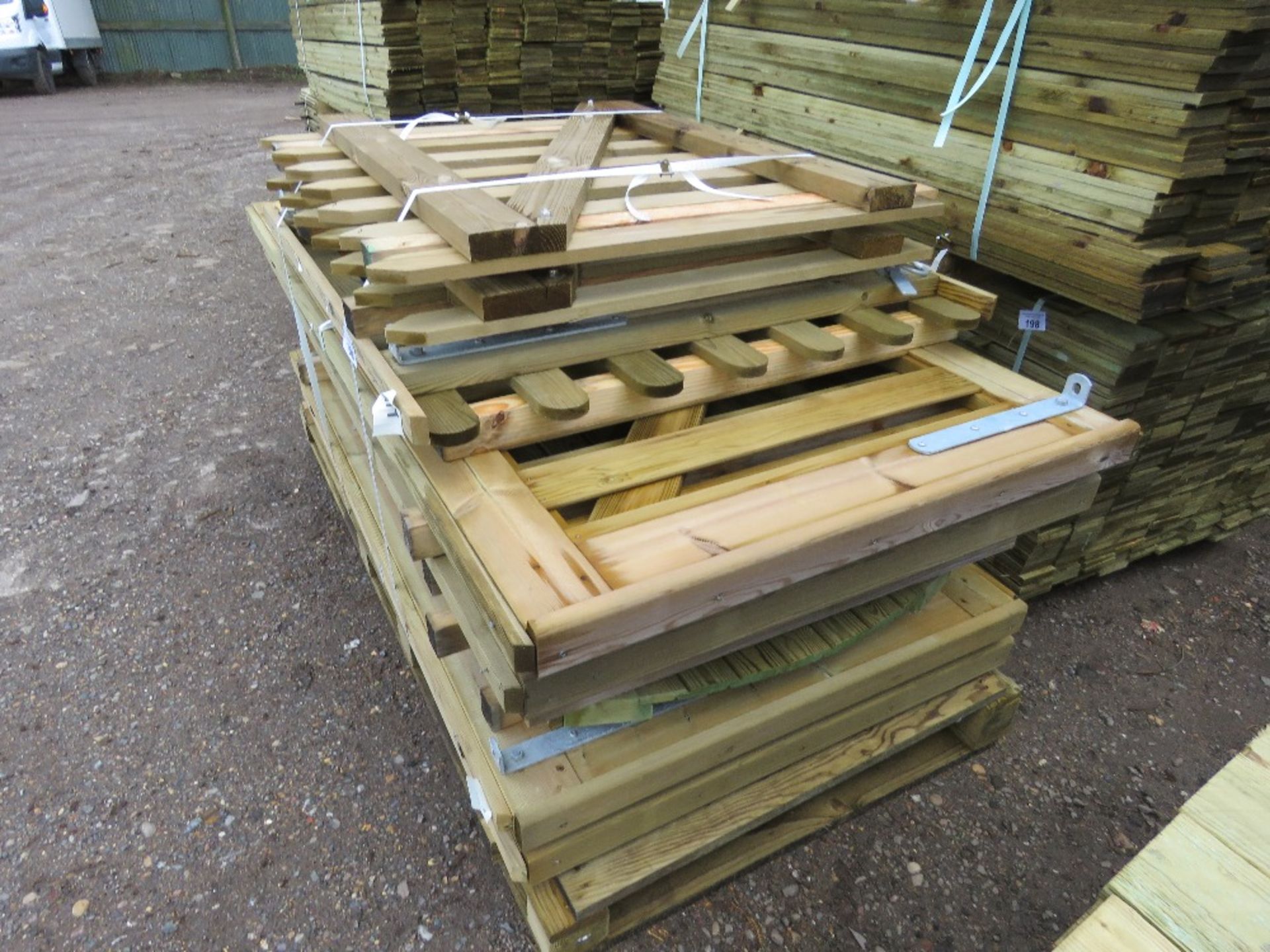 STACK OF 9NO MIXED SIZED WOODEN GARDEN GATES. - Image 2 of 3