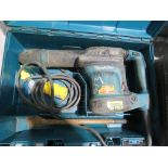 MAKITA MEDIUM SIZED BREAKER DRILL IN A CASE, 110VOLT. OWNER RETIRING. THIS LOT IS SOLD UNDER THE