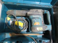 MAKITA MEDIUM SIZED BREAKER DRILL IN A CASE, 110VOLT. OWNER RETIRING. THIS LOT IS SOLD UNDER THE
