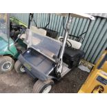 EZGO PETROL ENGINED GOLF BUGGY. BLACK COLOURED. WHEN TESTED WAS SEEN TO RUN, DRIVE, STEER AND BRAKE.