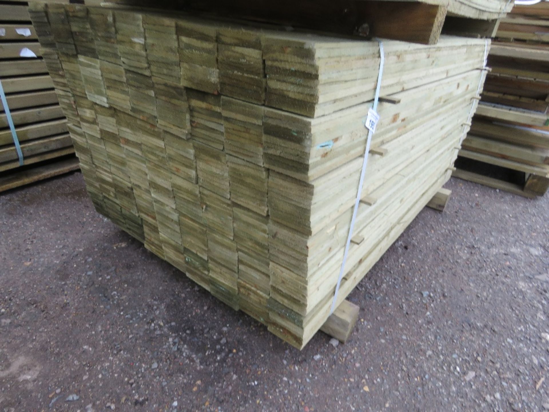 LARGE PACK OF TREATED FEATHER EDGE FENCE CLADDING TIMBER BOARDS. 1.50M LENGTH X 100MM WIDTH APPROX. - Image 2 of 4