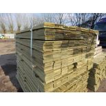 LARGE PACK OF TREATED HIT AND MISS TIMBER CLADDING BOARDS 1.74M LENGTH X 100MM WIDTH APPROX.