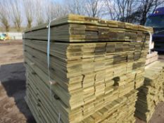 LARGE PACK OF TREATED HIT AND MISS TIMBER CLADDING BOARDS 1.74M LENGTH X 100MM WIDTH APPROX.