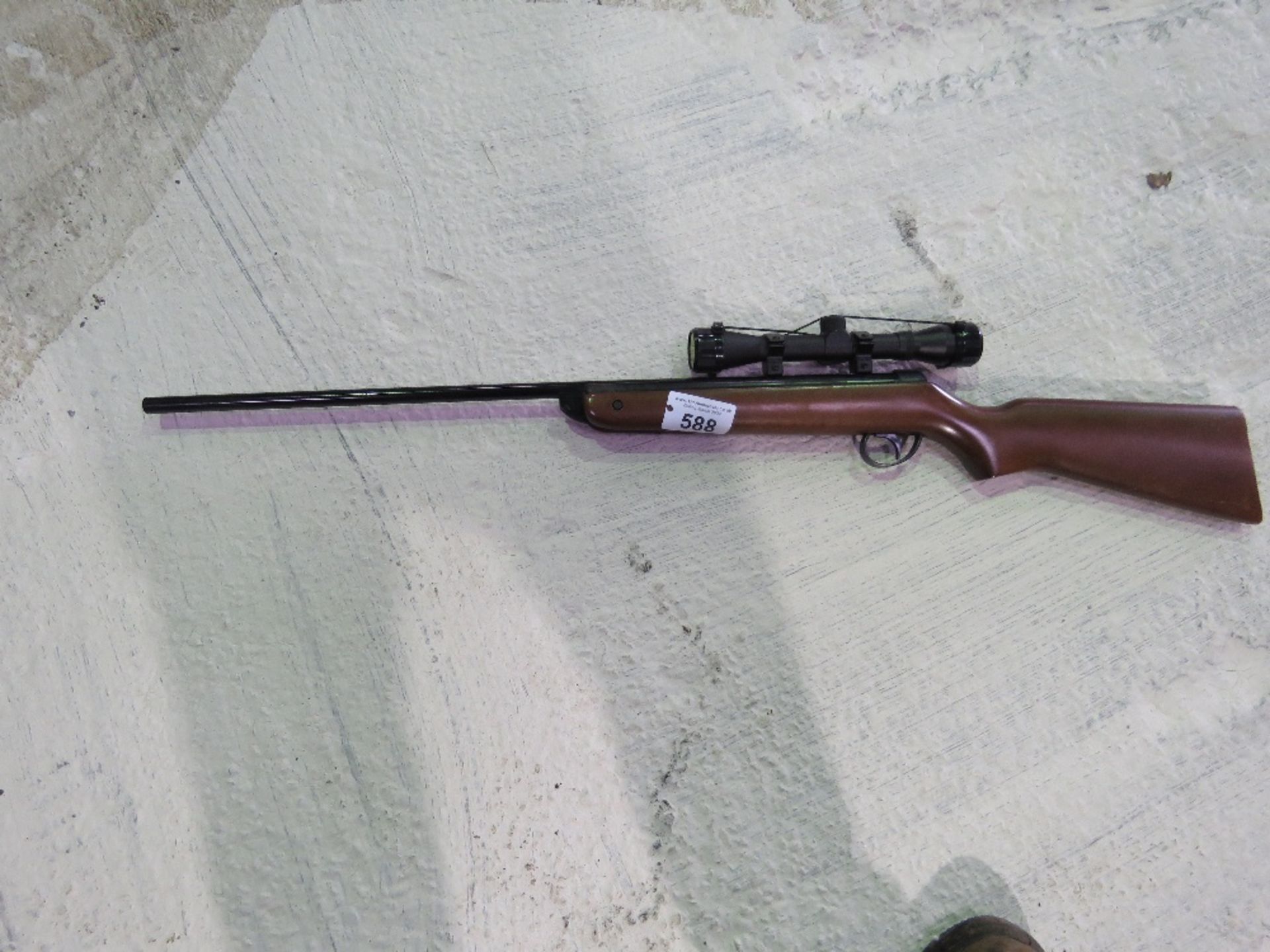 AIR RIFLE WITH TELESCOPIC SIGHT. THIS LOT IS SOLD UNDER THE AUCTIONEERS MARGIN SCHEME, THEREFORE