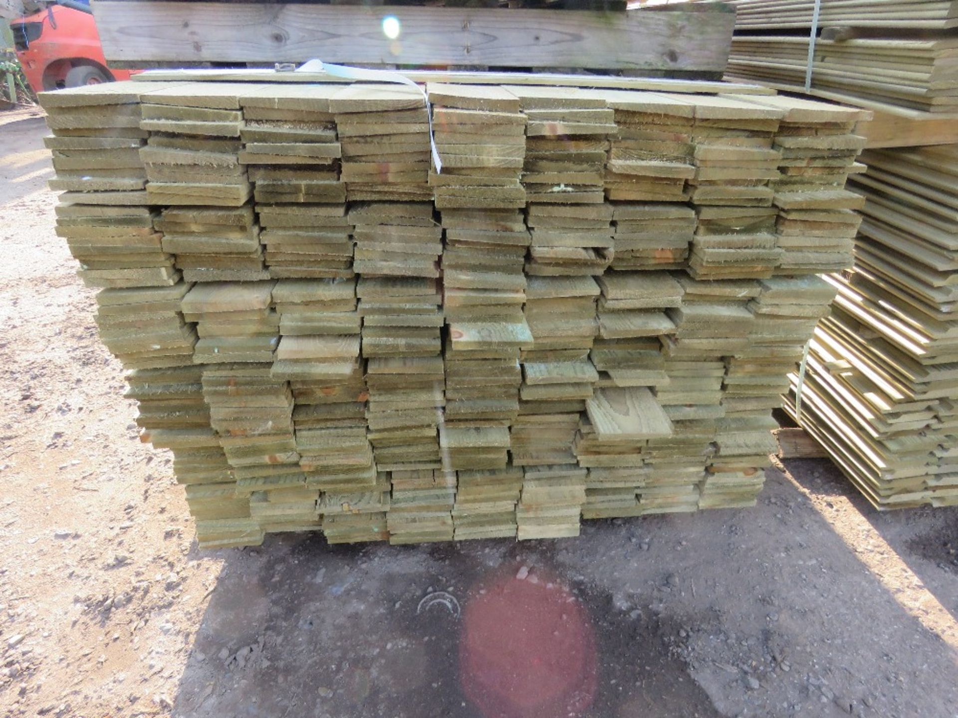 LARGE PACK OF TREATED FEATHER EDGE TIMBER CLADDING BOARDS 1.8M LENGTH X 100MM WIDTH APPROX. - Image 2 of 3