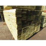 LARGE PACK OF TREATED FEATHER EDGE TIMBER CLADDING BOARDS 1.8M LENGTH X 100MM WIDTH APPROX.